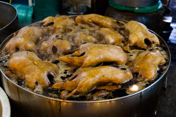 Boiling duck stewed in the gravy sauce in the pot