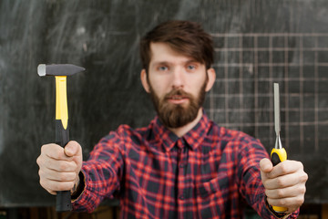 carpenter working in workshop. Close-up.
