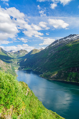 Fototapeta na wymiar Geirangerfjord and town Geiranger by summer, Norway