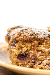 Cake with cherries over white with copy space