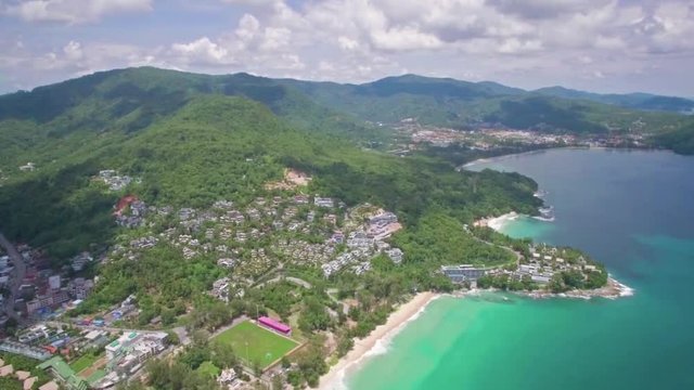 High Aerial Shot Overlooking Surin, Laem Singh and Kamala Beaches in Phuket Thailand
