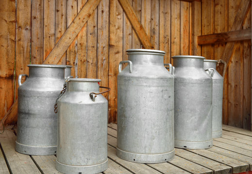 Old Milk Cans On Dairy Farm