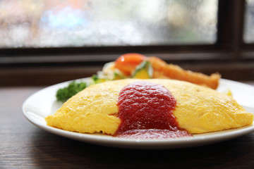 omelette with fried rice and shrimp tempura Japanese food