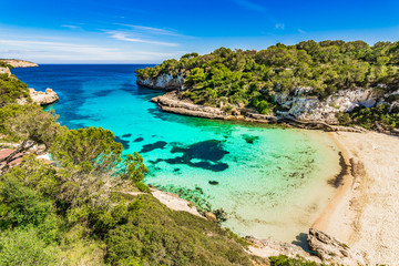 Fototapeta na wymiar Idyllic view of the beautiful beach cove of Cala Llombards on Majorca Spain, Mediterranean Sea