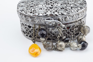 Metal jewlelry box with amber pendant