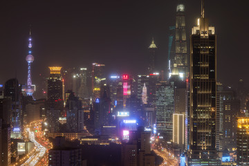 Fototapeta na wymiar Shanghai, China - March 2, 2017: Shanghai skyline at night with the Shanghai Tower and Shanghai World Financial Center on background