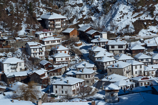 Winter scene. Shiroka Laka village at Bulgaria during a sunny winter day.