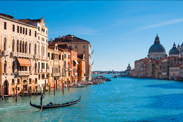 Fototapeta na wymiar Grand canal in Venice with a gondola passing