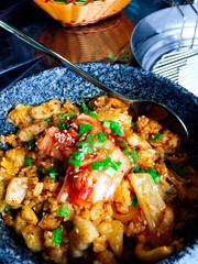 Hot bowl of Kimchi rice in Korean style