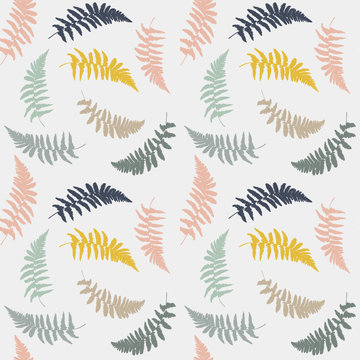 Vector seamless floral pattern with hand drawn wild  fern leaves in yellow, blue, green, brown and gray pastel colors.