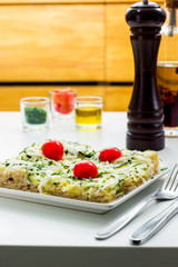 Square pizza served on a plate