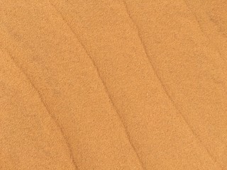 Golden sands with texture on the beach