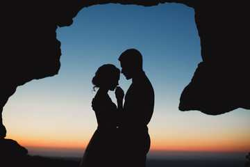 wedding couple at sunset in the mountains