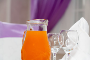 decanter with juice on a table at restaurant