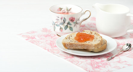 Watermelon Jam, Herbal Tea, Marshmallows. White Wooden Table