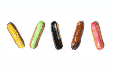 Group of french dessert Eclair on white background.