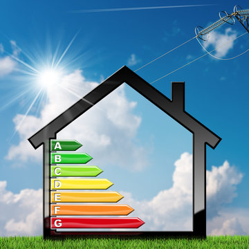 Energy Efficiency - Symbol in the shape of house on blue sky with clouds and sun rays