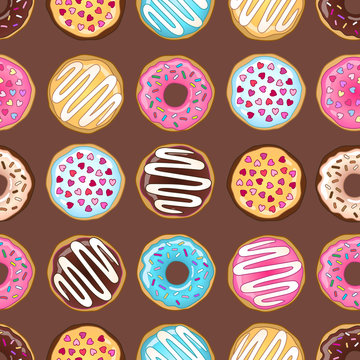 Multicolor donuts seamless pattern on the pink and orange lines background.