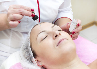 Process cosmetic mask of massage and facials in beauty salon
