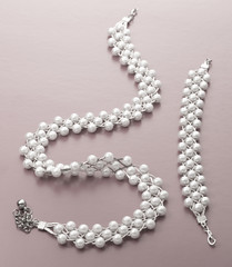 Necklace and wristband with white beads