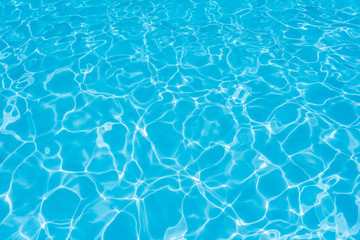 Obraz premium Blue water surface and ripple wave in pool