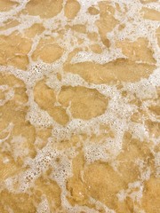 Sea waves reaching lapping to shore