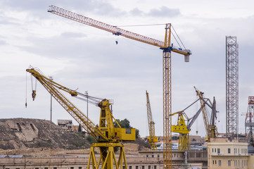Cranes in the port, Malta, Three cities