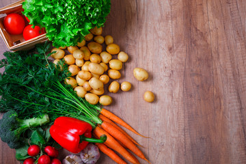 Vegetables. Potatoes, carrot and red pepper. Lettuce salad, garlic and brocoli. Red radish and tomatoes. Natural organic bio food.