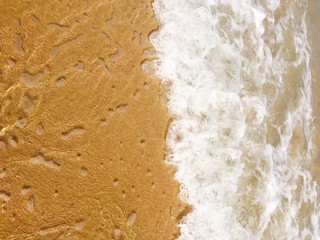 Sea waves reaching lapping to shore
