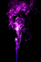 Purple smoke on a black background