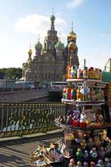 Souvenirs matryoshka dolls at the Church of Savior on the Spilled Blood in St. Petersburg, Russian...