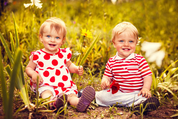 Happy twins boy and girl