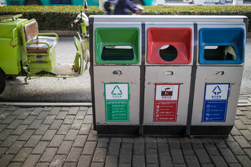 Trash on concrete outdoors in the city.