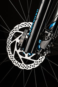 mountain bicycle disk brake system on dark background