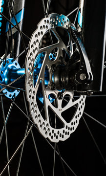 mountain bicycle disk brake system on dark background