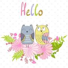Card with cartoon owls in bright colors.