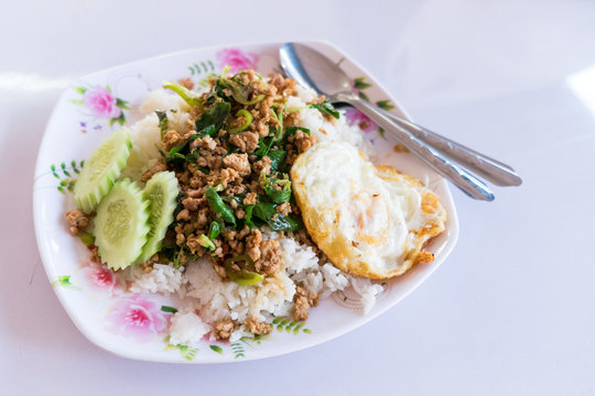 Rice topped with stir-fried minced pork and basil
