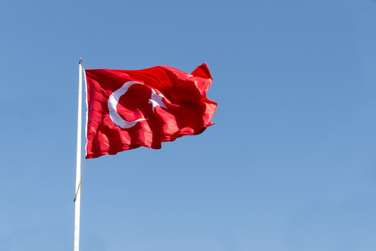 Turkey republic flag waving in the blue sky