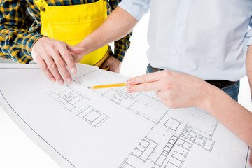 Architects examining blueprint
