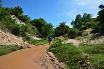 Fototapeta premium Fairy Stream (Suoi Tien), red canyon in Mui Ne, Vietnam