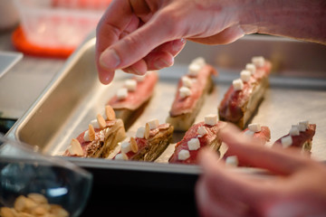 Close-up of male hands preparing molecular dish