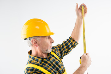 Mature workman in hard hat