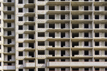 Facade wall of construction cite concrete building, pattern or background