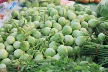 heap eggplant at market