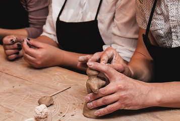 Obraz na płótnie Canvas hands working with clay