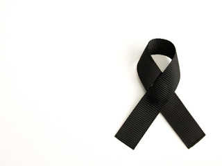 Black ribbon awareness on white background