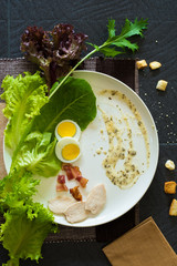 Obraz na płótnie Canvas Caesar chicken salad in different look