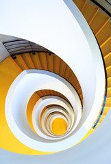Obraz premium Unique yellow spiral staircase at Bibliothèque Universitaire de Chevreul in Lyon 2 Lumière.