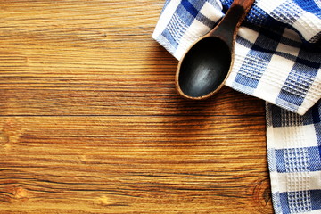 Wooden spoon on wood texture of dining table . Top view Kitchen and food concept