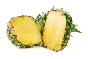 pineapple cut into two halves isolated on a white background
